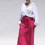 This Sapphire Pink silk slip skirt is cut on the bias for a fluid finish and falls elegantly to the ankle. Model Image