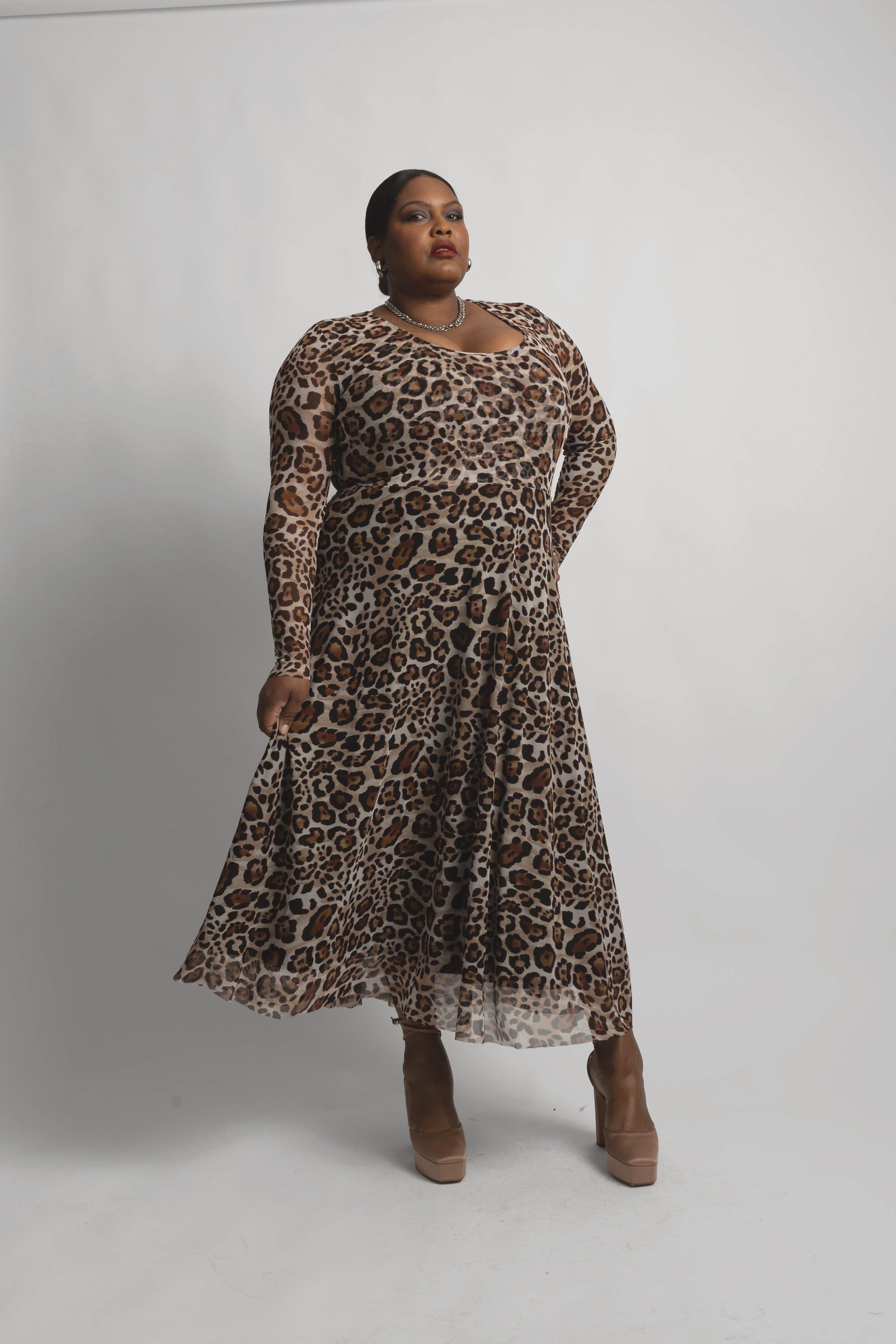 model wearing the new leopard mesh dress