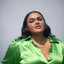 plus model wearing green sigourney blouse