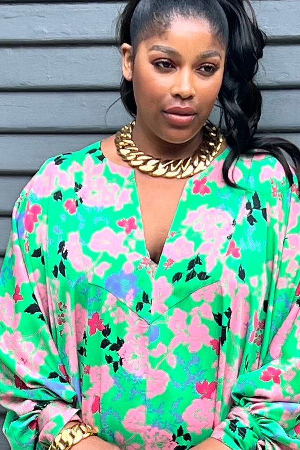 The Trapunto Blouse is the same shape as the Trapunto Kaftan in a blouse length. With a full drape of fabric that gathers into the wide beautiful cuffs. Details include a deep v-front, trapunto stitching, on cuffs and yolk, mother of pearl buttons with fabric loop closure in back. Pair this blouse with all your or reconstructed denim Maxi skirt or your favorite pair of jeans. looks great over a solid slip or bias skirt for that new two piece-dressing.