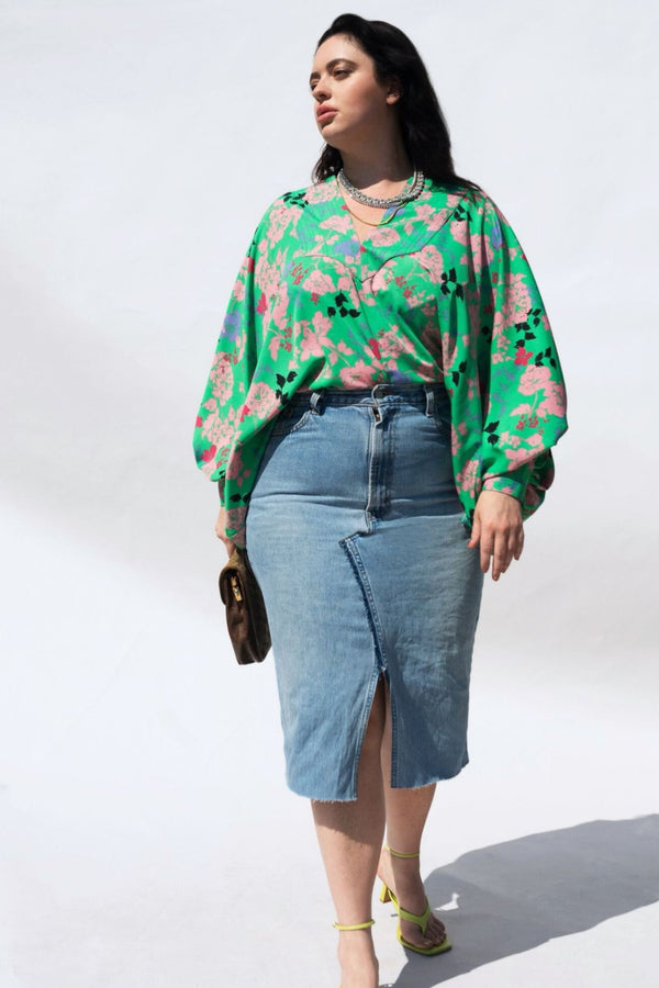 This Denim slit front midi is the ultimate in street smart style. Made with up-cycled jeans. Every skirt is hand constructed making each piece unique and one of a kind. Totally authentic and sustainable too. Designed to fit the "True Size Majority" sizes 10-22+.