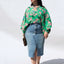This Denim slit front midi is the ultimate in street smart style. Made with up-cycled jeans. Every skirt is hand constructed making each piece unique and one of a kind. Totally authentic and sustainable too. Designed to fit the "True Size Majority" sizes 10-22+.