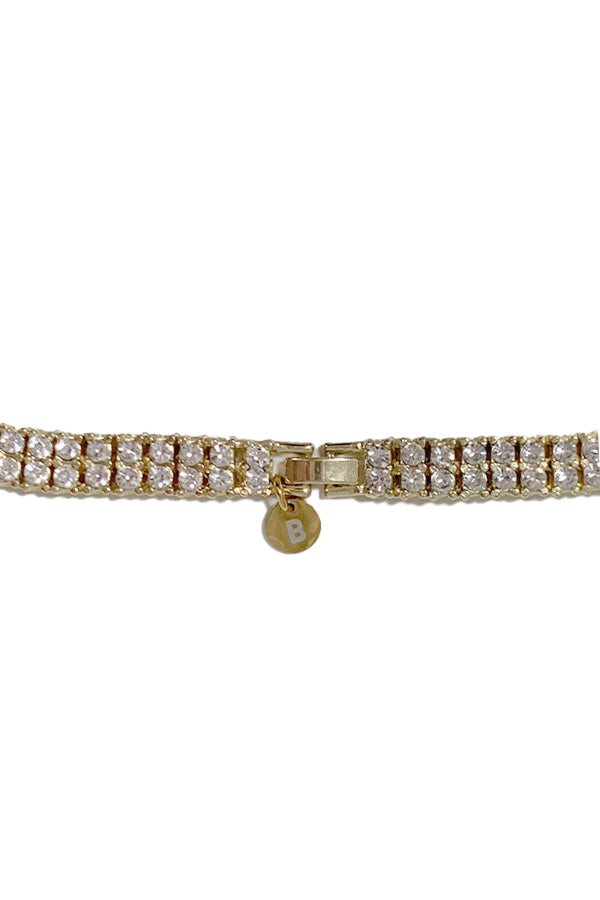 Always a classic and always in style - our Tennis Necklace - wear one or stack them high. Designed to match our tennis bracelets. 14k gold plated stainless steel with a double row of CZ crystals - will not tarnish and hypoallergenic. details