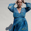 Our best-selling, now classic, maxi wrap dress! The luxurious blue silk chiffon gives this dress a very unique, flowy look. Wear with our navy slip dress or on its own for a sheerly fantastic look. Designed to fit the "True Size Majority" sizes 10-22+