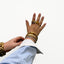 jewelry stacks on hand with bracelets and rings