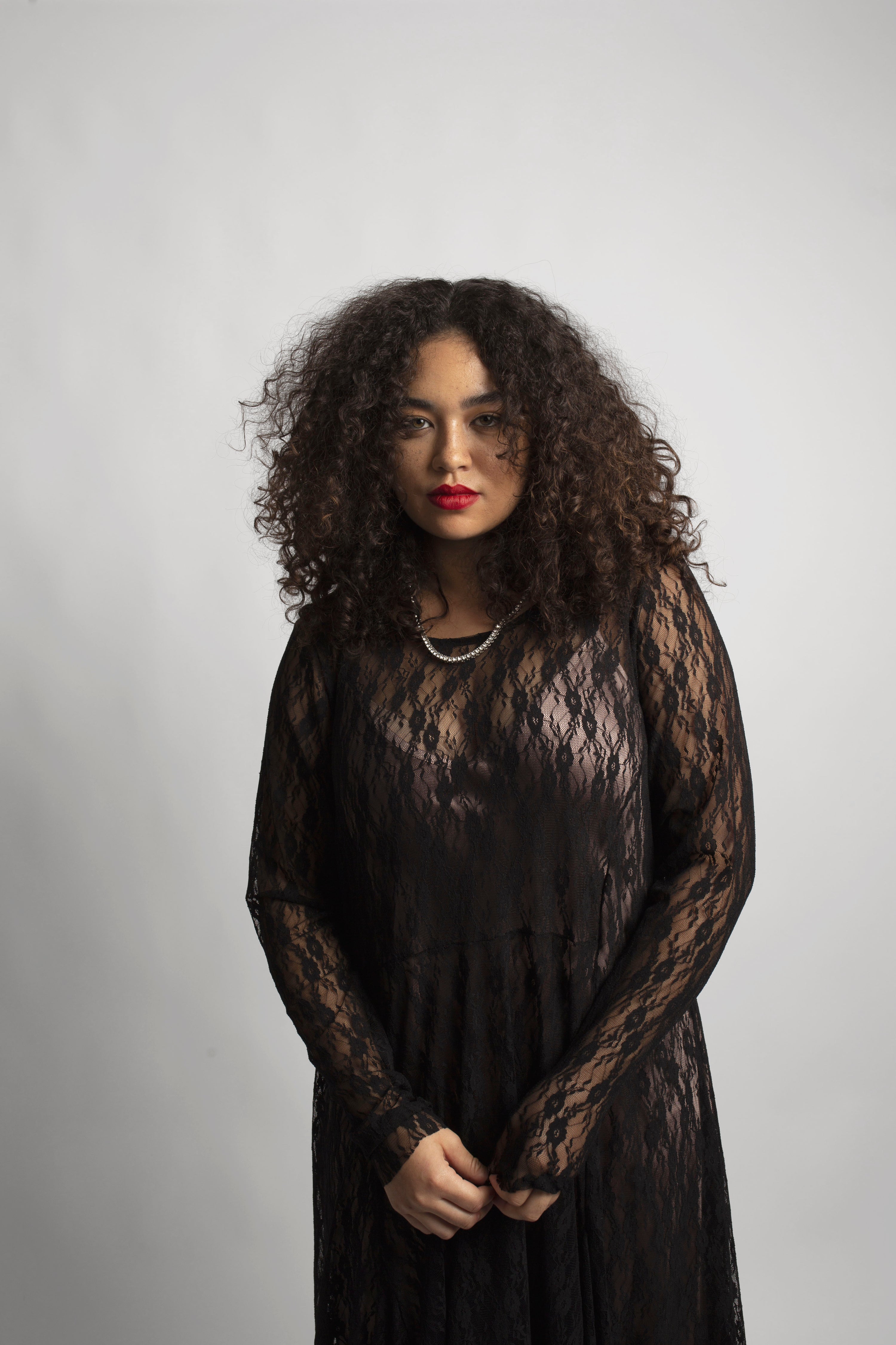 close up of model wearing the lace mesh dress