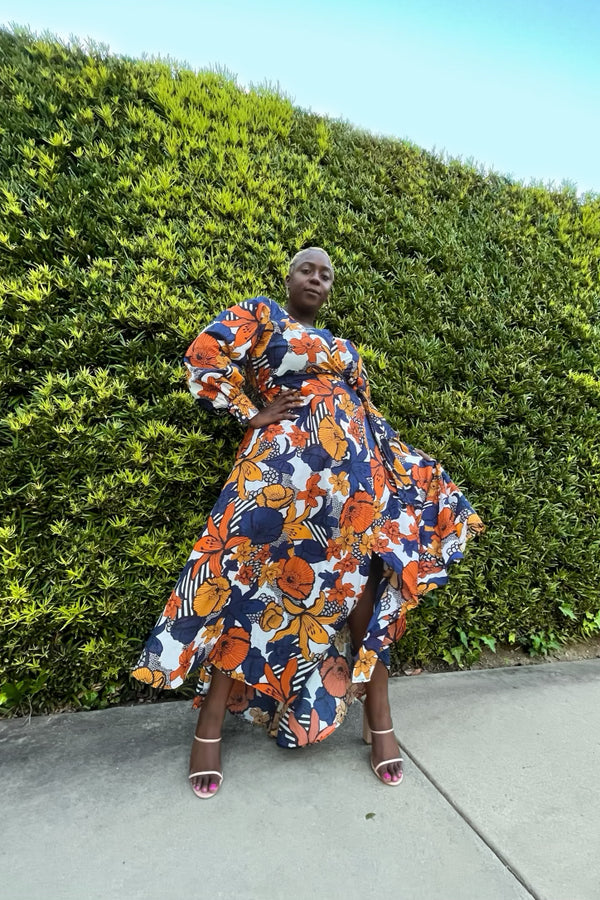 Marigold Wrap Dress - As a true wrap dress, it adjusts to fit you perfectly. A wide belt defines your waist, while vintage faux pearl buttons close the banded cuffs. Designed by Cynthia Vincent - BAACAL - Designed to fit the "True Size Majority" 10-22+ Shown on Model