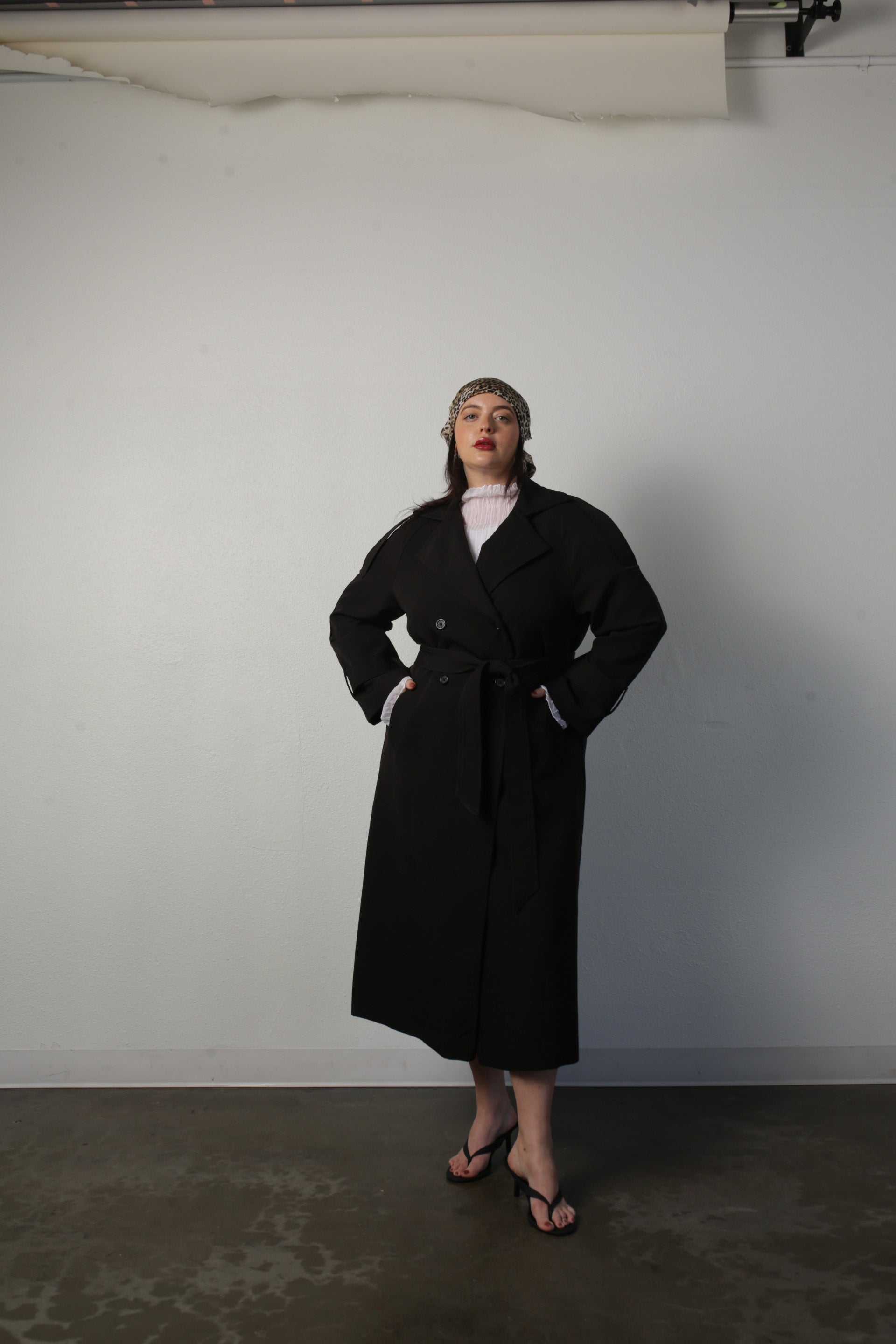 model wearing black aria coat