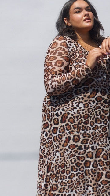 plus size model wearing new leopard mesh dress