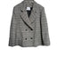 Double Breasted Blazer has a slightly oversized ﬁt.  Looks great open belted or buttoned up.  Made of a lightweight Wool blend, double-breasted with tailored shoulders. A go-anywhere wear any way favorite you will reach for from Fall through Spring. 