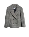 Double Breasted Blazer has a slightly oversized ﬁt.  Looks great open belted or buttoned up.  Made of a lightweight Wool blend, double-breasted with tailored shoulders. A go-anywhere wear any way favorite you will reach for from Fall through Spring. 
