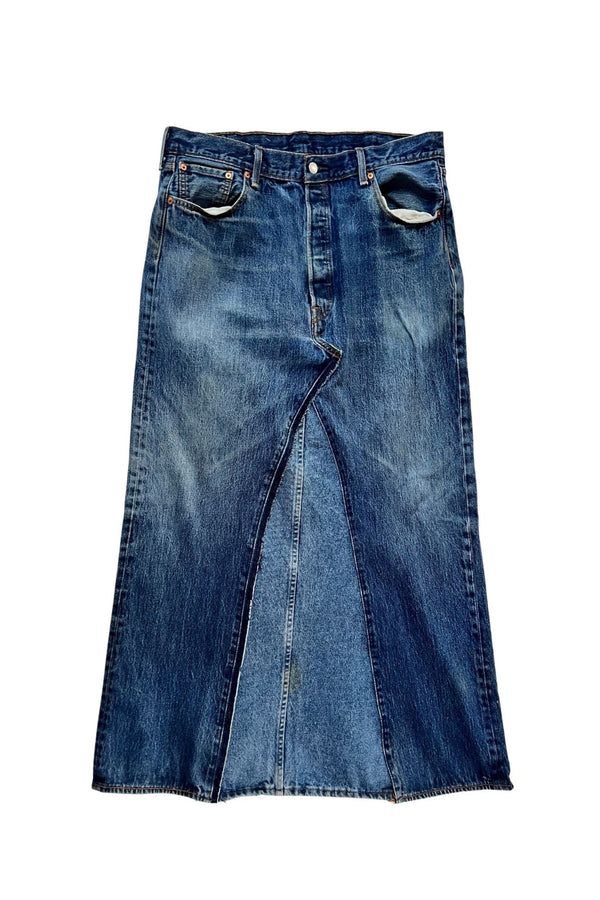 This Denim maxi is the ultimate in street smart style. Made with up-cycled jeans.  Every skirt is hand constructed from two pairs of jeans, making each piece unique and one of a kind.   Totally authentic and sustainable to