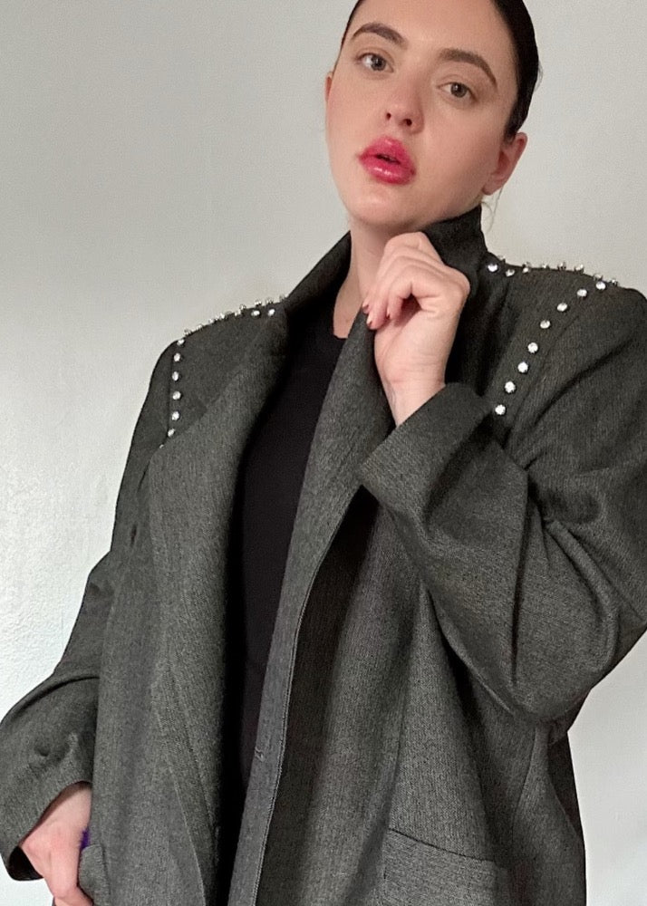 model wearing herringbone coat with crystals