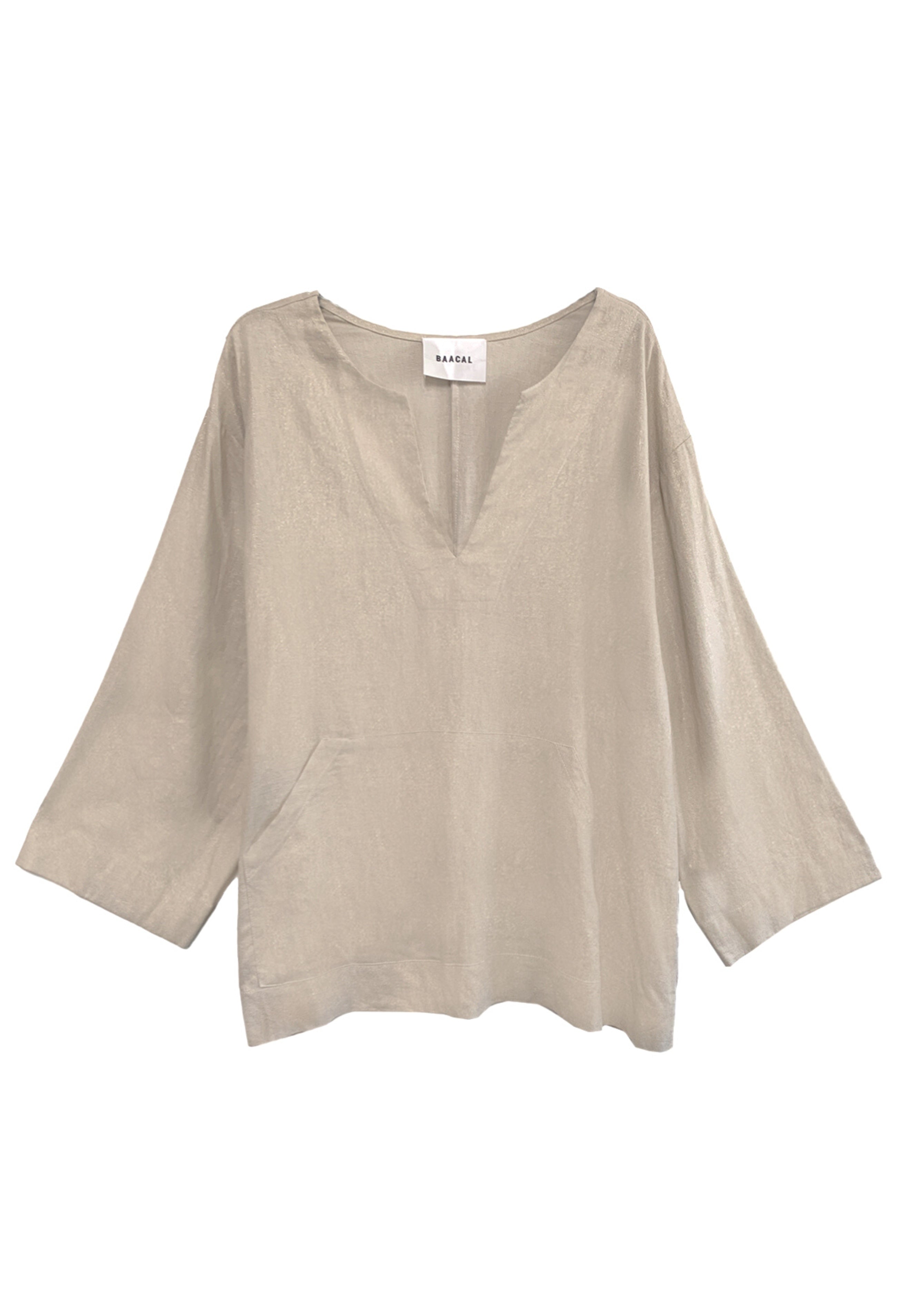 Our Jallaba Top is just what your closet is missing.  The effortless silhouette makes this style easy and comfortable, yet makes a statement. This top will take you from lounging at home to an evening out when paired with statement earrings and an elegant sandals. This style has an easy relaxed fit. Think that staple piece you found when you were traveling. Sustainable fabric and timeless. Designed by Cynthia Vincent for the "true size majority" sizes 10-22. 