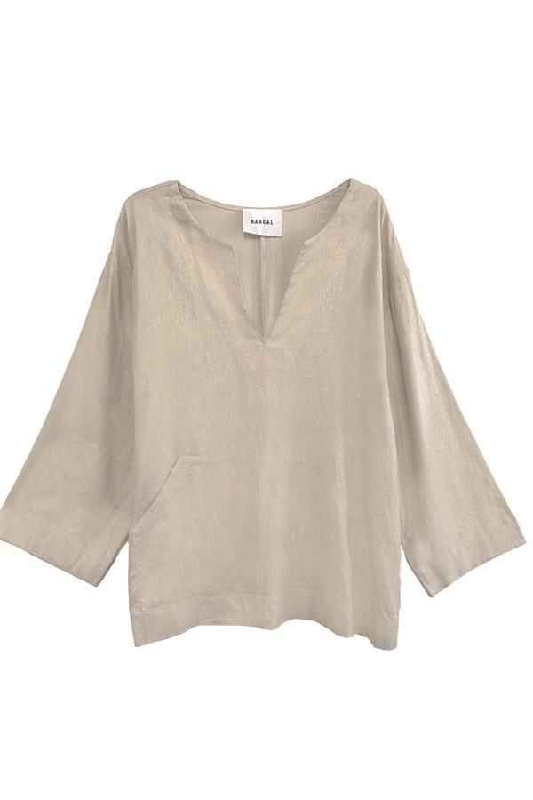 Our Jallaba Top is just what your closet is missing.  The effortless silhouette makes this style easy and comfortable, yet makes a statement. This top will take you from lounging at home to an evening out when paired with statement earrings and an elegant sandals. This style has an easy relaxed fit. Think that staple piece you found when you were traveling. Sustainable fabric and timeless. Designed by Cynthia Vincent for the "true size majority" sizes 10-22. 