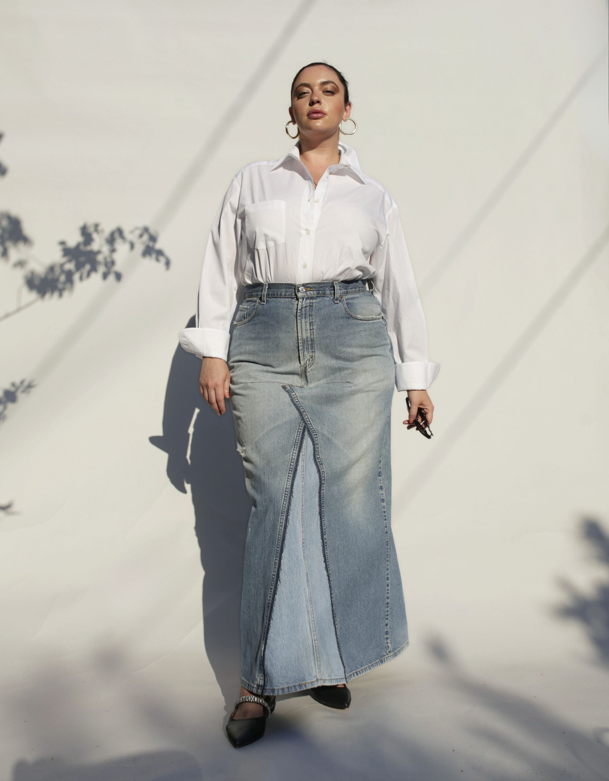 This Denim maxi is the ultimate in street smart style. Made with up-cycled jeans.  Every skirt is hand constructed from two pairs of jeans, making each piece unique and one of a kind.   Totally authentic and sustainable too. Designed to fit the "True Size Majority" sizes 10-22+.