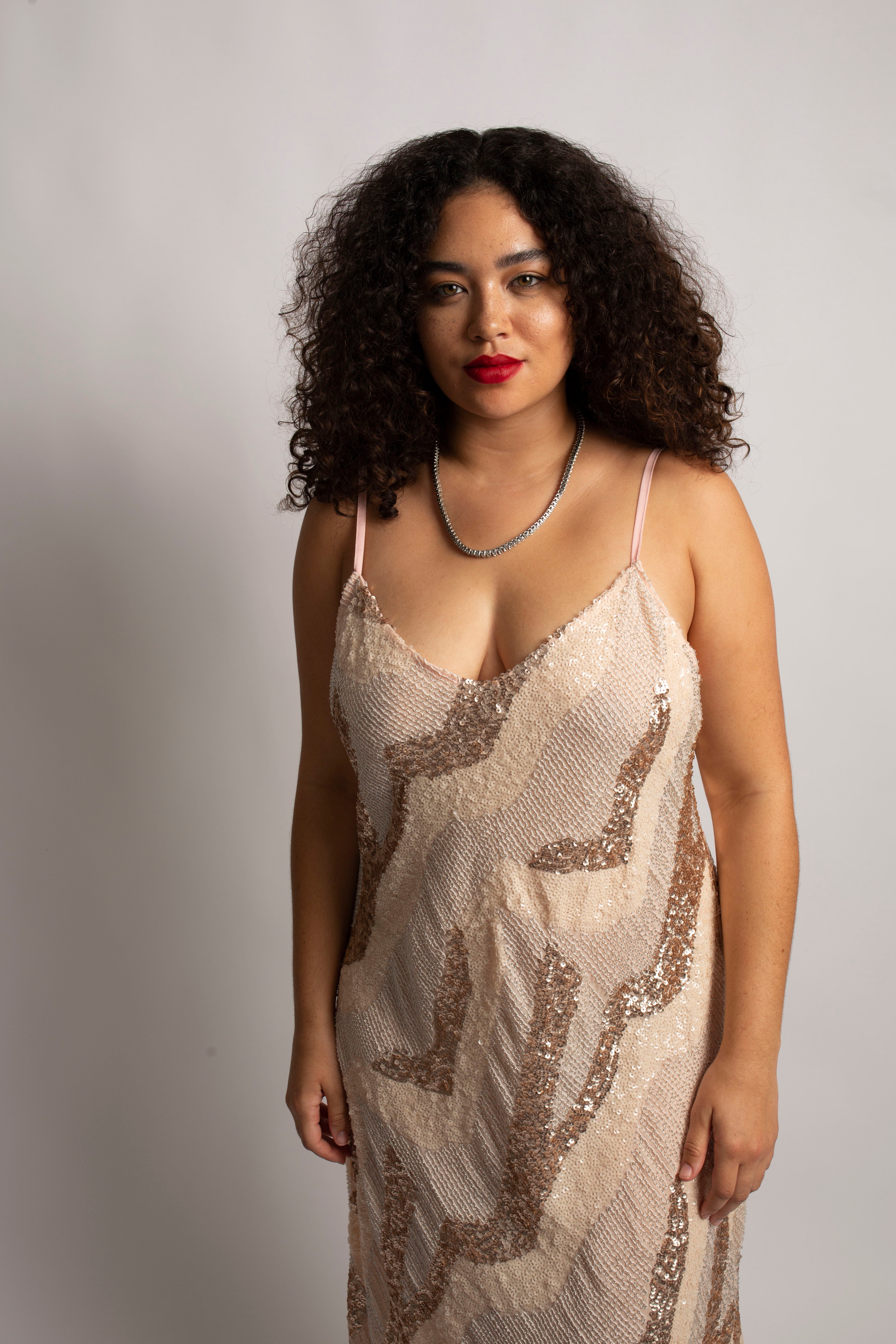 model wearing beaded cabaret dress