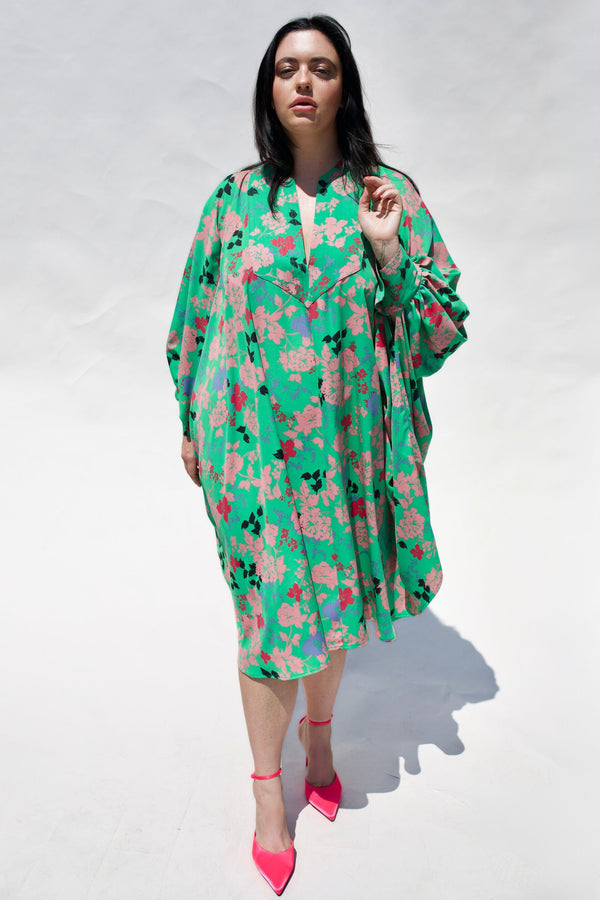 The Trapunto Kaftan is our newest Kaftan style. The Midi is 47" in length.  This is our most lux in styling and shape to date.  With a full drape of fabric that gathers into the wide beautiful cuffs. The cuffs and front yolk feature the multi-rows of trapunto stitching. 
