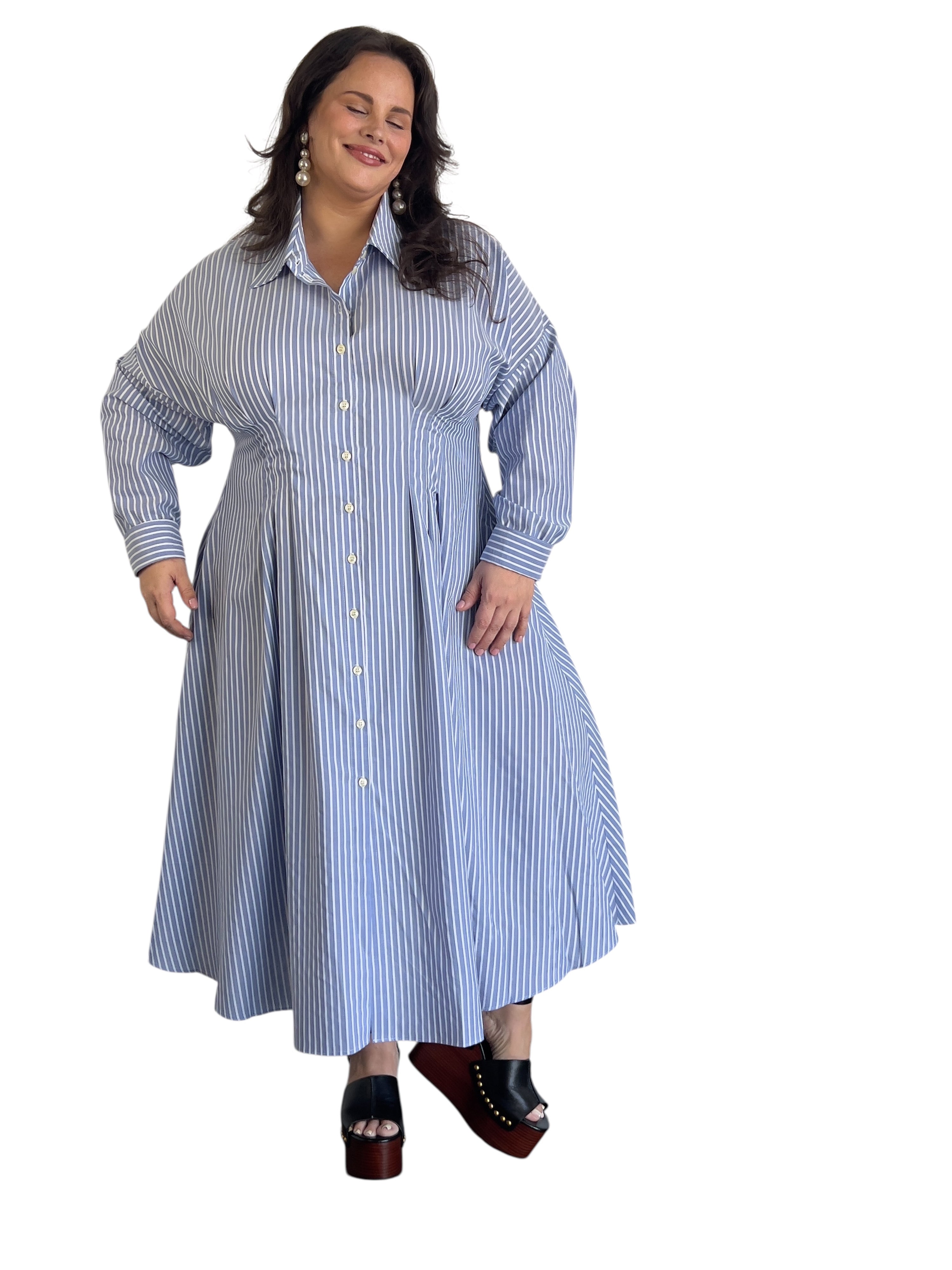 model wearing the cinched waist shirt dress