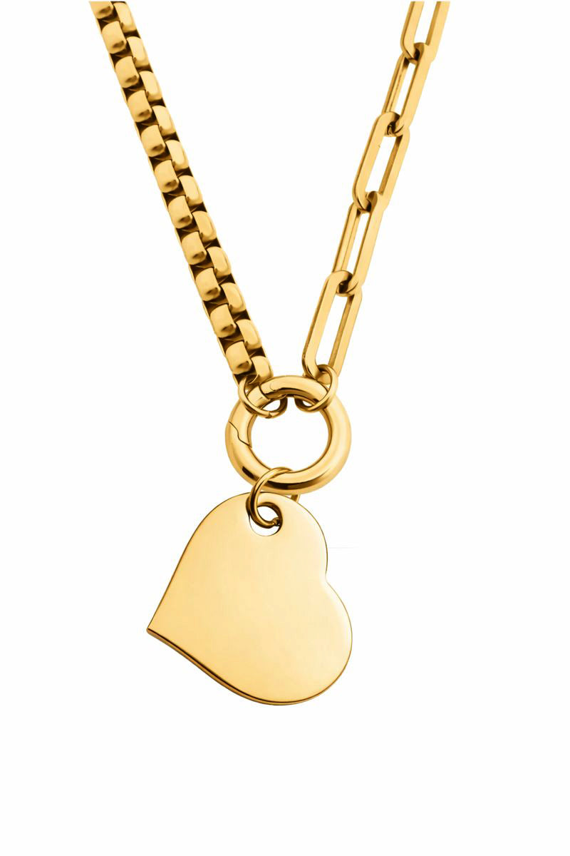 Gold necklace with a heart-shaped pendant on a white background