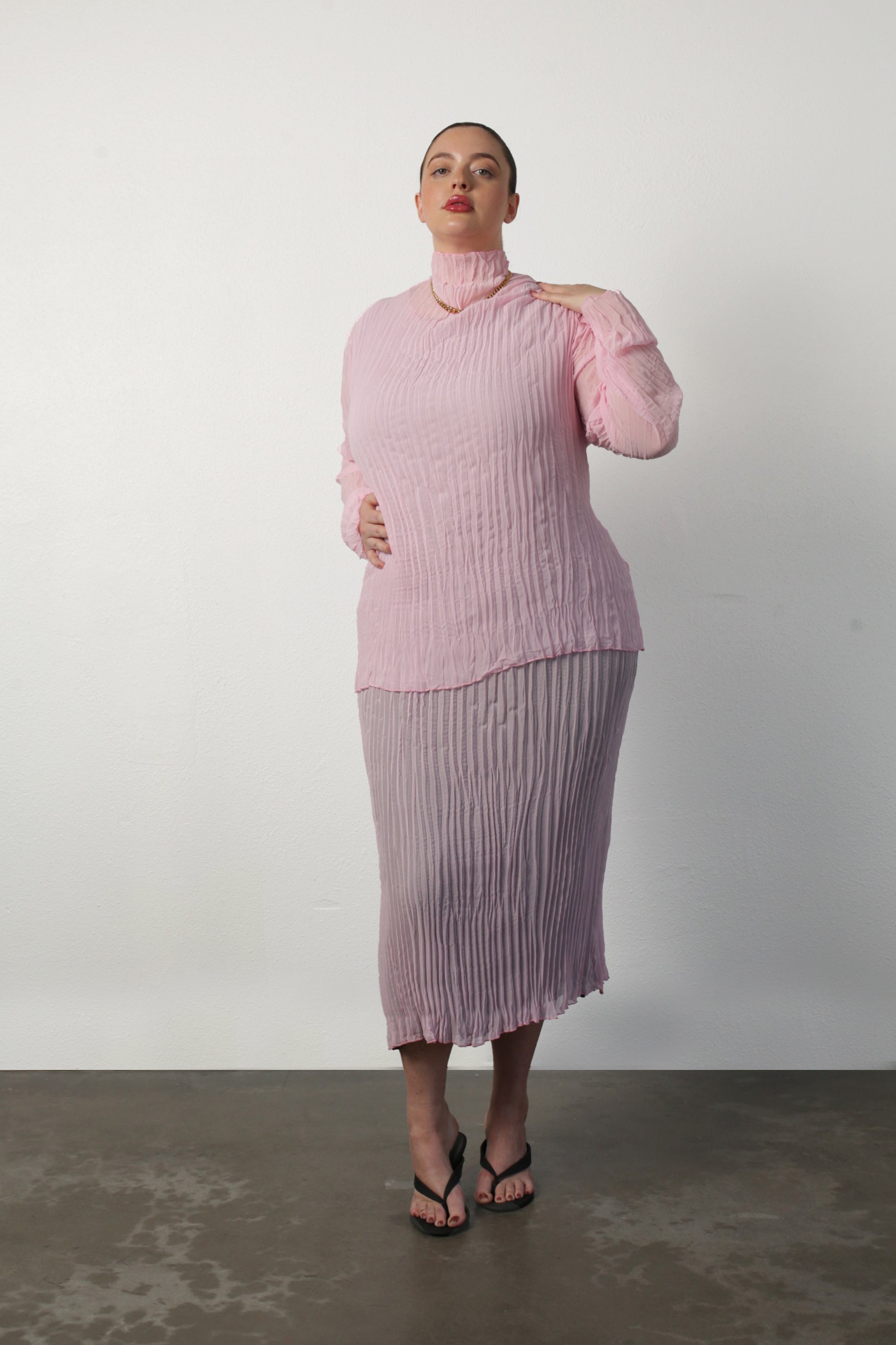 model wearing jaya on the pink side with Esme in pink