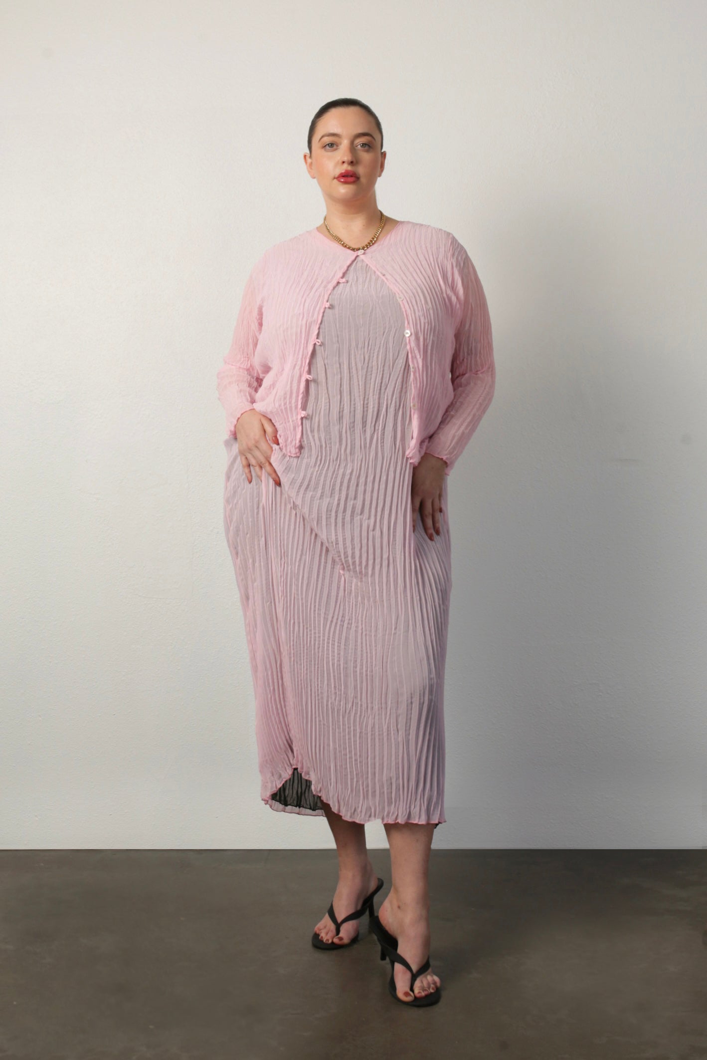 plus size model wearing jaya dress and Maya Cardi in pink