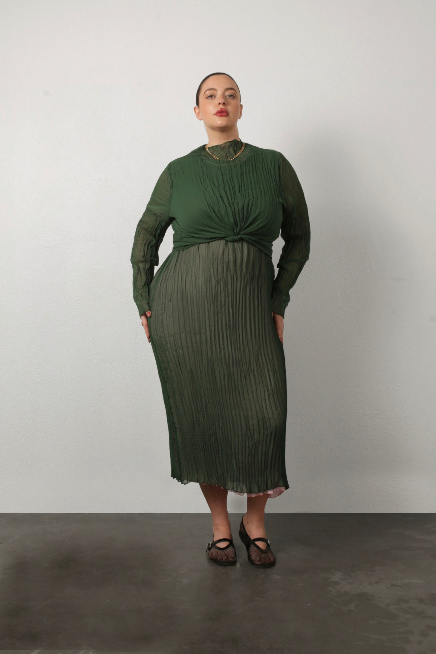 model wearing green Esme tied with jaya on the green side