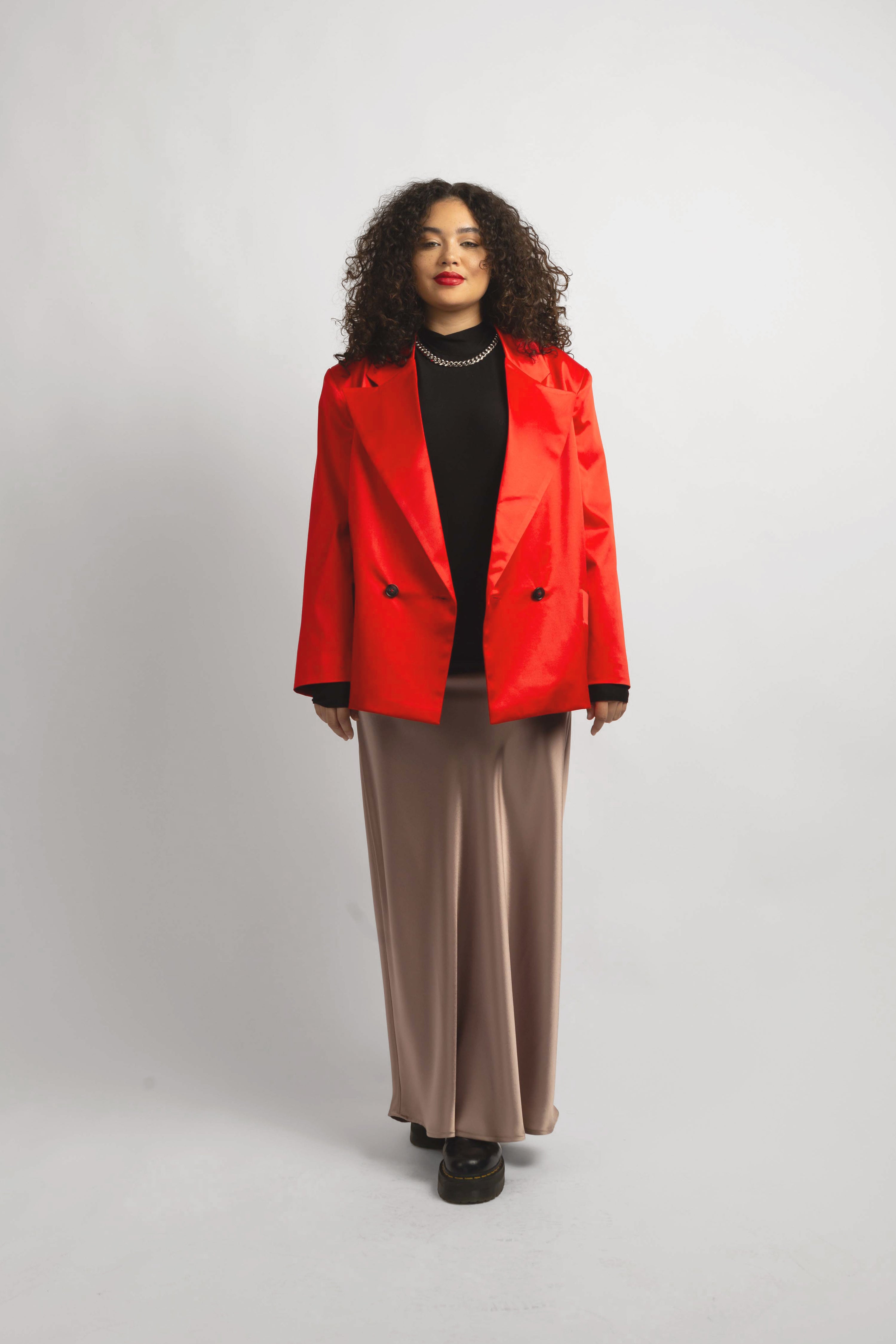 model wearing the red Lexi blazer with slip dress