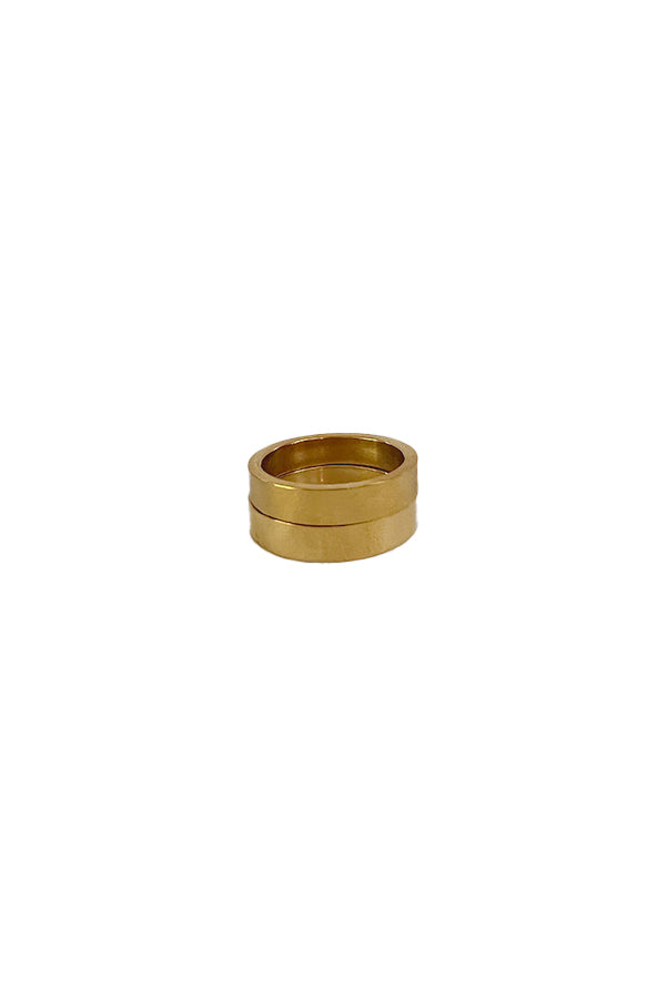 BAACAL - The Flat Band ring.  This one, in the same shiny gold finish.  Modern line with a beautiful weight to it.  Perfect to wear alone or stacked.   A stylish option for almost any occasion or your finishing touch to wear every day. 