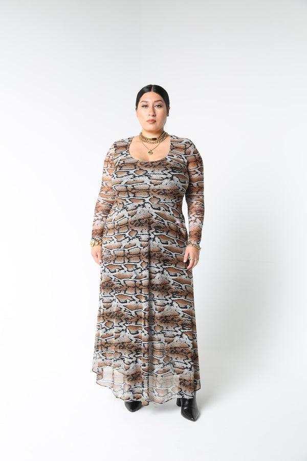 The Graham mesh dress. This double mesh midi dress is here in a rich snake print. Details include a deep ballet neckline, high waist seam, and pockets. The front body and skirt are doubled with sheer sleeves and back. Designed to fit by BAACAL Cynthia Vincent for "The True Size Majority" sizes 10-22.