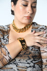 This is the Mac Daddy of Cuban Link necklaces.    A timeless, bold statement piece with a deep gold shine.   A timeless, statement piece with a deep gold shine. Perfect for almost any occasion or your everyday finishing touch to your outfits. measures 22” long . Designed to fit the true size majority.  (close up)