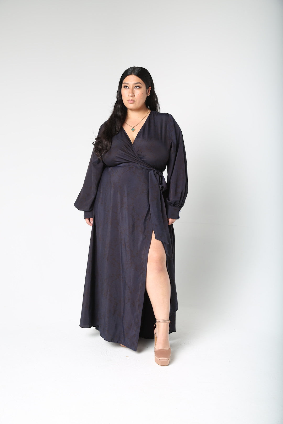 Our best-selling now classic maxi wrap dress! This one is washed and over-dyed with an ink-blue color.  A faint floral print shows through Ink blue giving this dress a very unique look. Designed to fit the true size majority - sizes 10-22+