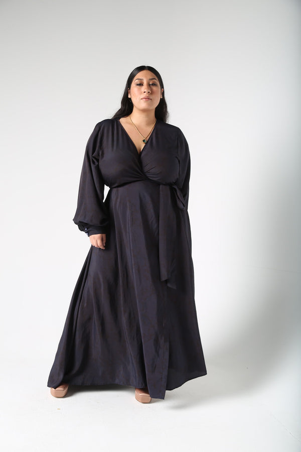 Our best-selling now classic maxi wrap dress! This one is washed and over-dyed with an ink-blue color.  A faint floral print shows through Ink blue giving this dress a very unique look. Designed to fit the true size majority - sizes 10-22+