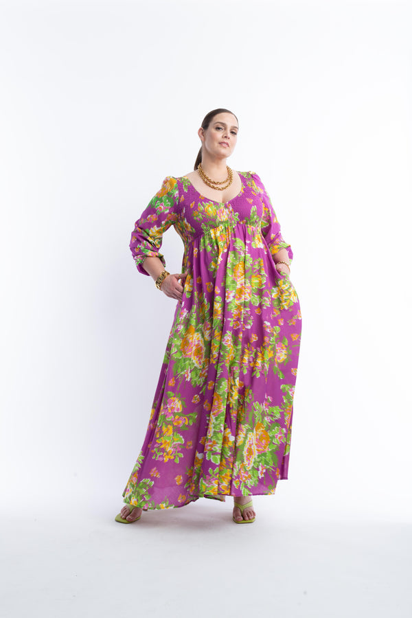 Style and comfort has never felt and looked so good! Perfect for everyday and special occasions - this super easy breezy floral maxi dress will be your favorite season after season. With a fully smocked bodice, The Joni fits and flatters most all body types. Available in an extensive range of sizes. Shown on model.