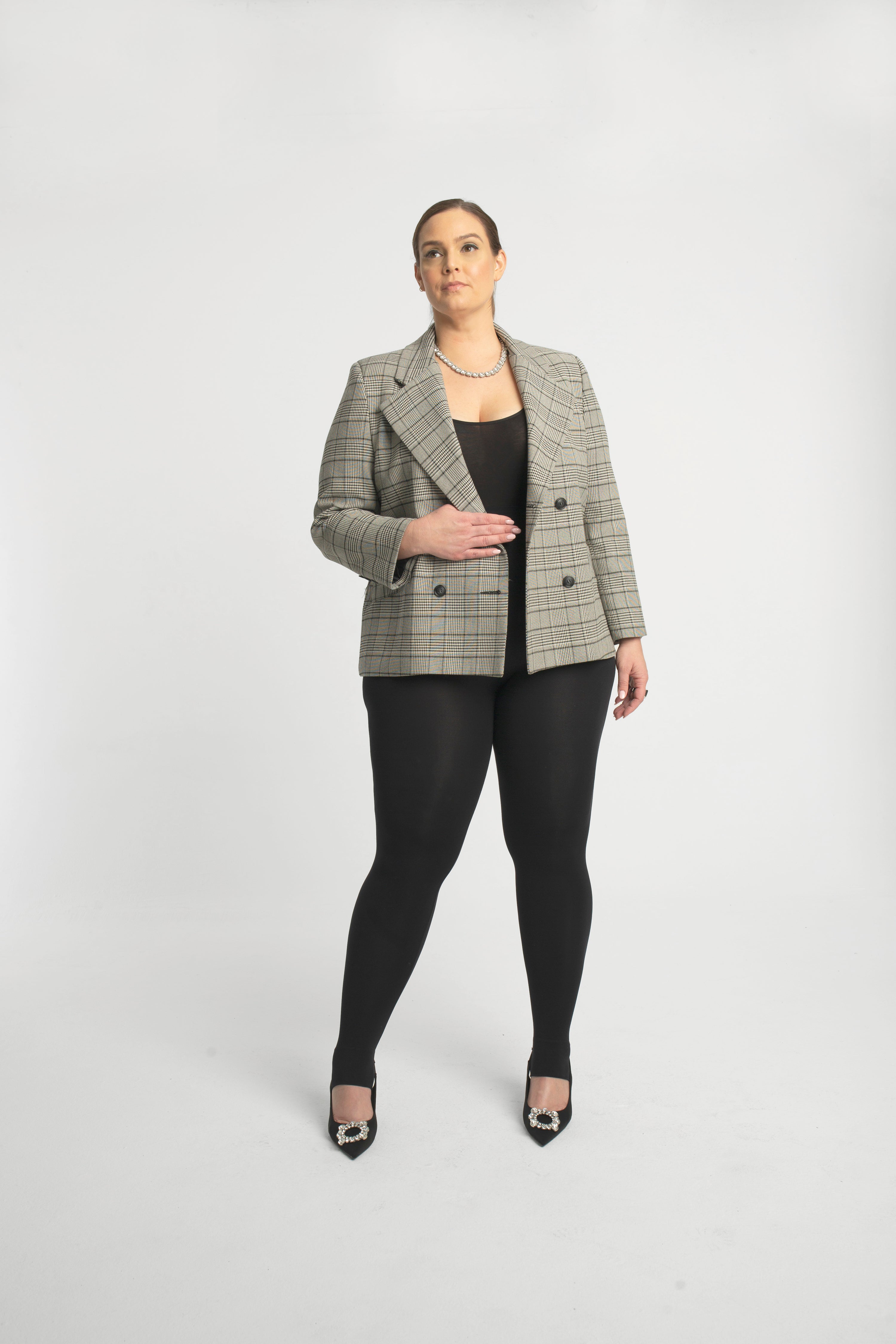 Double Breasted Blazer has a slightly oversized ﬁt.  Looks great open belted or buttoned up.  Made of a lightweight Wool blend, double-breasted with tailored shoulders. A go-anywhere wear any way favorite you will reach for from Fall through Spring. 