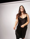 V-neck bias cut slip on dress, with adjustable straps, in black crepe back satin. Plus Size, Size Inclusive Dress