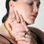 BAACAL thin gold plated stacking rings. Shown on model wearing additional BAACAL jewelry.