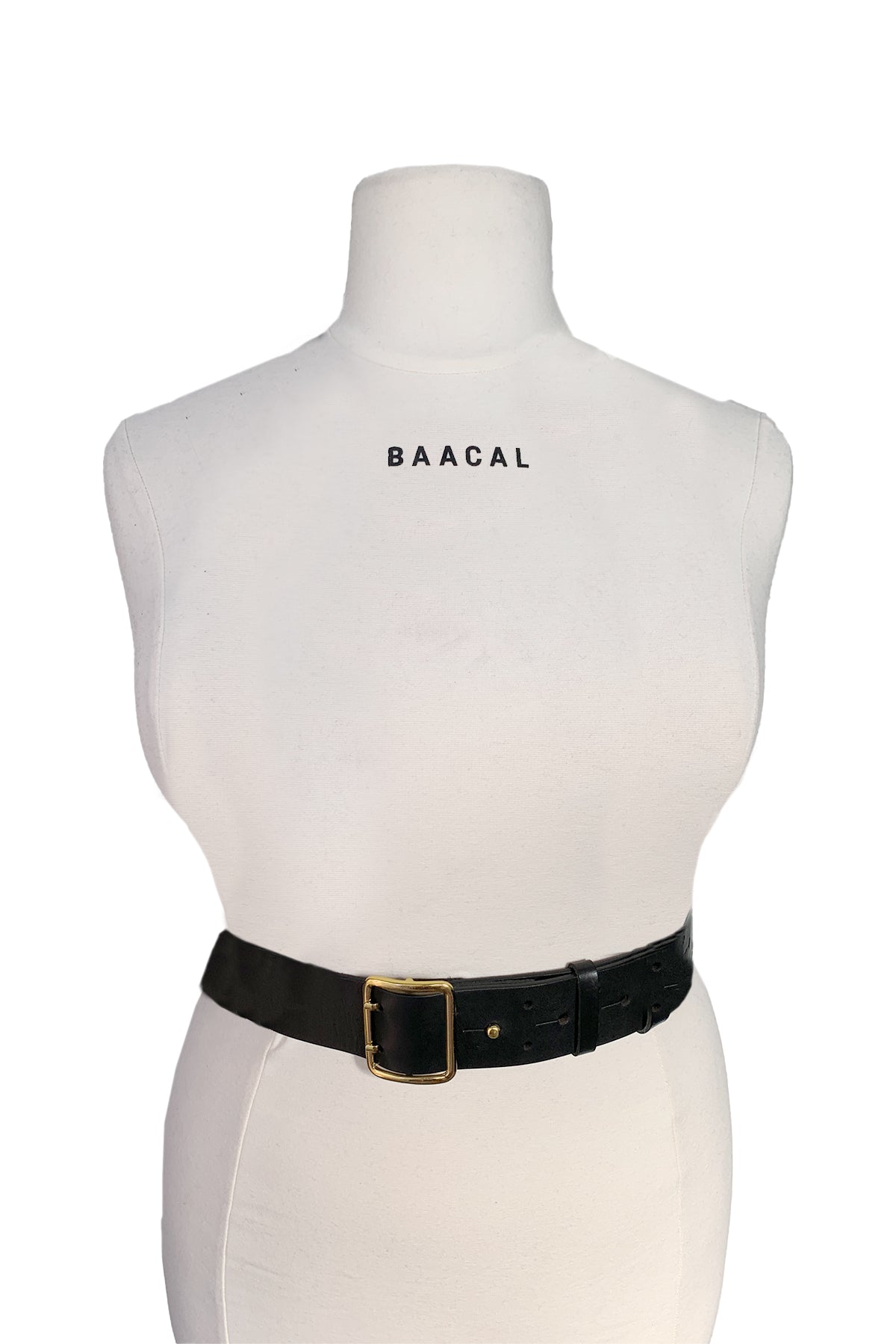 Made of genuine leather, this is the easiest wardrobe update piece! Add the harness strap to give this classic black belt a different look. Layer over dresses, tops, and suits for an edgy and modern look. Made for "The True Majority" sizes 10-22 by BAACAL Cynthia Vincent.  Made in the USA