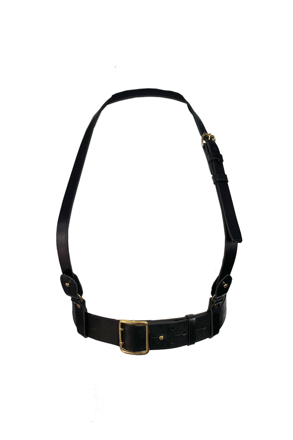 Made of genuine leather, this is the easiest wardrobe update piece! Add the harness strap to give this classic black belt a different look. Layer over dresses, tops, and suits for an edgy and modern look. Made for "The True Majority" sizes 10-22 by BAACAL Cynthia Vincent.  Made in the USA