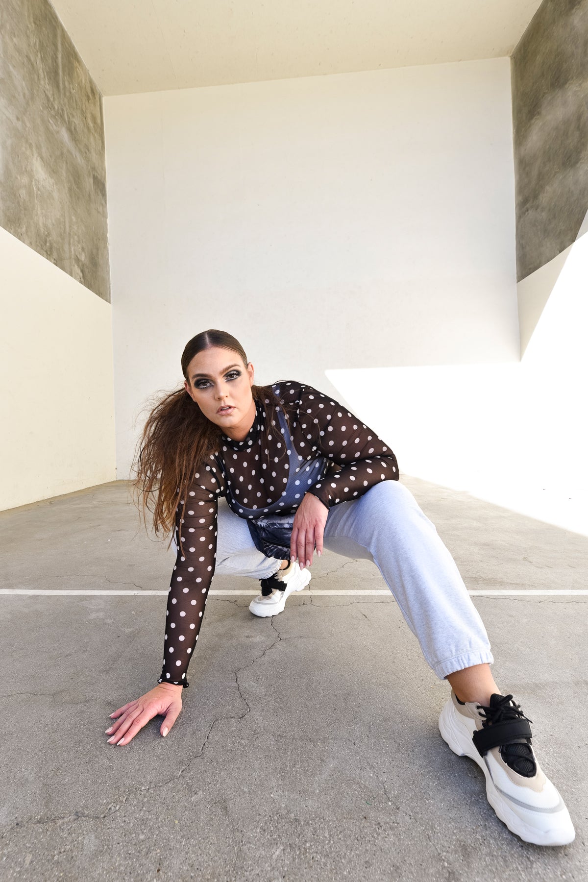 Playful White on Black dotted semi sheer mesh long sleeve top